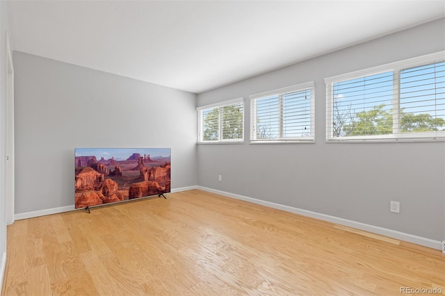 2366 S Troy St, Aurora, CO 80014 - unfurnished room featuring wood finished floors and baseboards