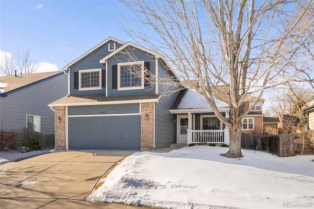 view of front of property with a garage and a porch