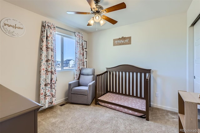 bedroom featuring baseboards, carpet, and a ceiling fan