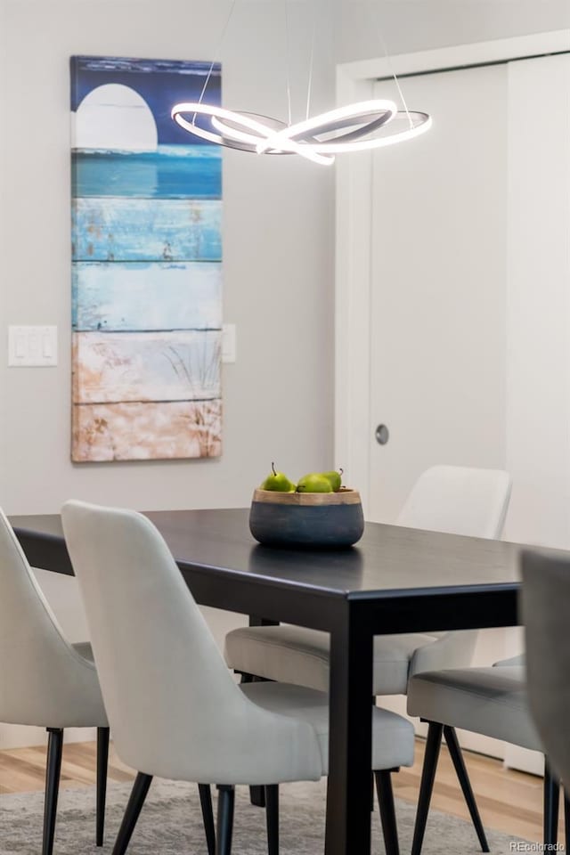 dining room with wood finished floors