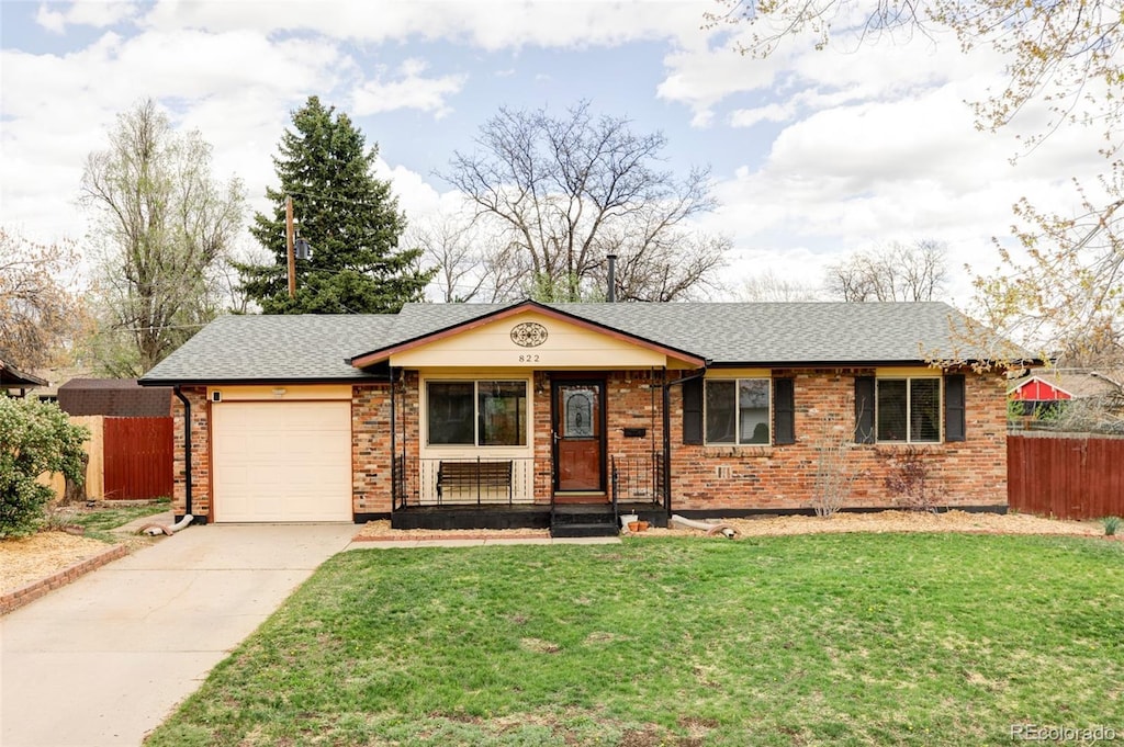 822 S Worchester St, Aurora, CO 80012 - ranch-style house with a garage, driveway, a shingled roof, and brick siding