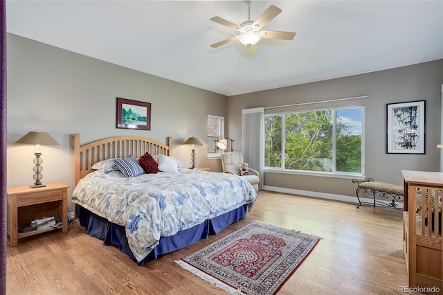 14879 Xenia St, Thornton, CO 80602 - bedroom featuring wood finished floors, baseboards, and ceiling fan