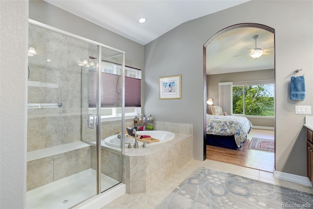 14879 Xenia St, Thornton, CO 80602 - full bathroom featuring a garden tub, tile patterned flooring, vanity, a stall shower, and ceiling fan
