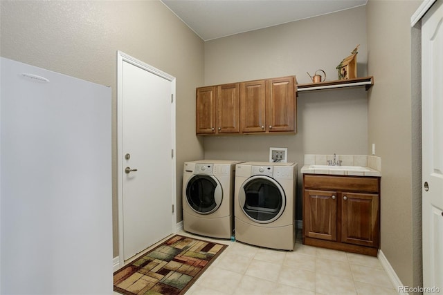 14879 Xenia St, Thornton, CO 80602 - laundry room featuring cabinet space and washing machine and clothes dryer