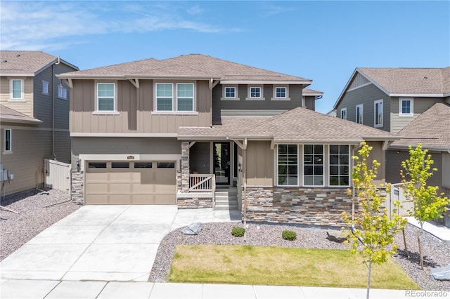 17121 Desert Wine Ln, Parker, CO 80134 - view of front of property with stone siding, board and batten siding, concrete driveway, and a garage