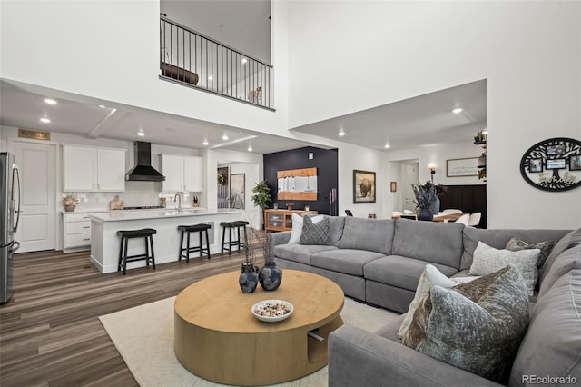 17121 Desert Wine Ln, Parker, CO 80134 - living room with dark wood-style flooring, recessed lighting, and a high ceiling