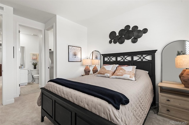 17121 Desert Wine Ln, Parker, CO 80134 - bedroom featuring light carpet and ensuite bathroom