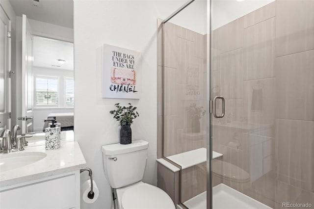 17121 Desert Wine Ln, Parker, CO 80134 - full bathroom with vanity, toilet, and a stall shower