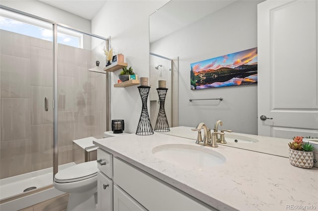 17121 Desert Wine Ln, Parker, CO 80134 - bathroom with vanity, a shower stall, and toilet