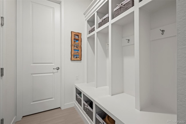 17121 Desert Wine Ln, Parker, CO 80134 - mudroom with light wood finished floors and baseboards