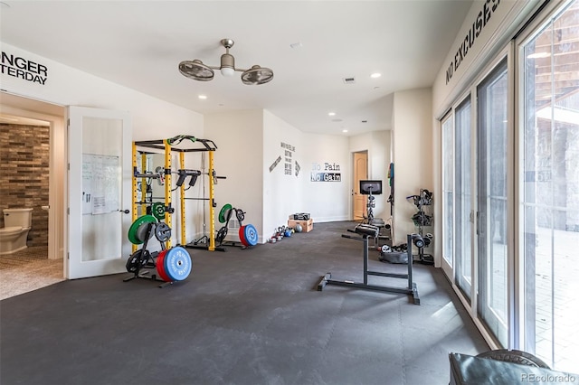 workout room featuring ceiling fan