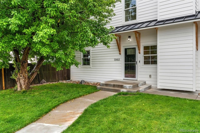 13483 Alcott Way, Broomfield, CO 80020 - doorway to property with a standing seam roof and metal roof