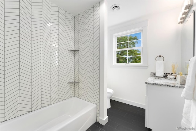 13483 Alcott Way, Broomfield, CO 80020 - full bathroom featuring vanity, toilet, tile patterned flooring, baseboards, and  shower combination