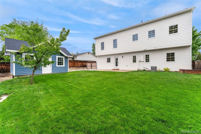 13483 Alcott Way, Broomfield, CO 80020 - back of property with an outbuilding, a patio area, and cooling unit