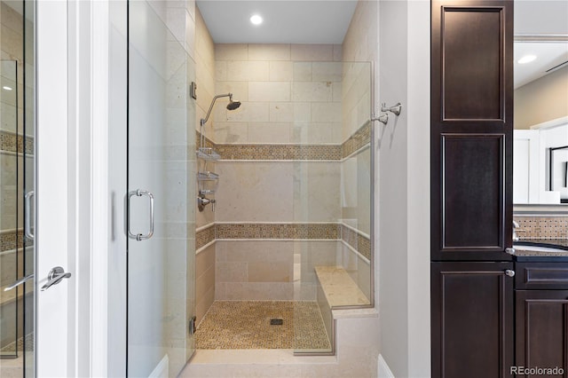 bathroom with sink and walk in shower