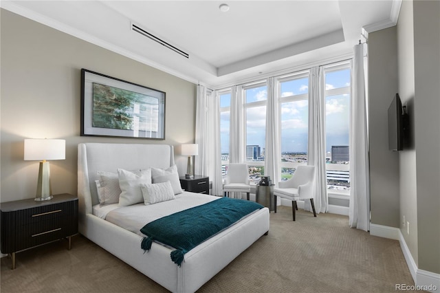 carpeted bedroom with ornamental molding