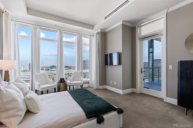 bedroom with carpet floors, ornamental molding, and access to outside