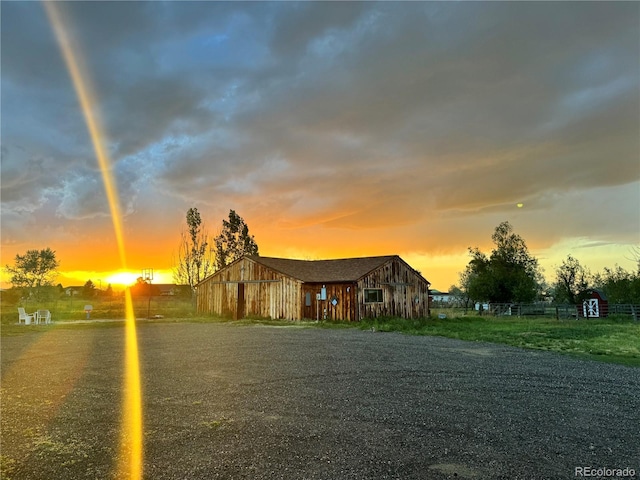 view of front of property featuring an outbuilding