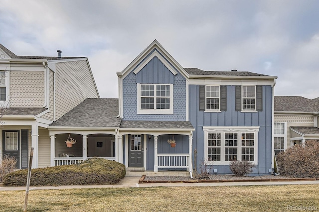 view of front of home featuring a porch and a front lawn