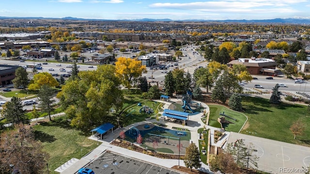 birds eye view of property featuring a mountain view