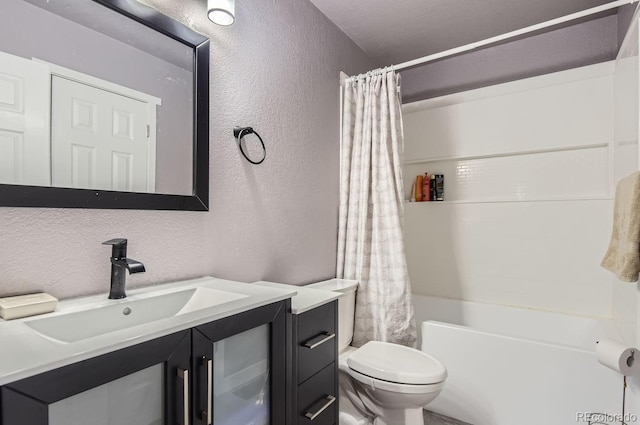 full bathroom with vanity, toilet, and shower / bath combo with shower curtain