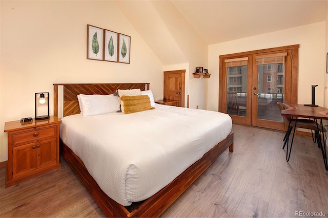 91 River Run Rd Unit 8140, Keystone, CO 80435 - bedroom with french doors, light wood finished floors, access to outside, and lofted ceiling