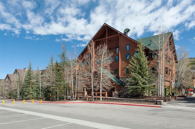 91 River Run Rd Unit 8140, Keystone, CO 80435 - view of building exterior featuring uncovered parking