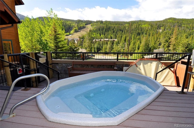 91 River Run Rd Unit 8140, Keystone, CO 80435 - view of swimming pool featuring a forest view