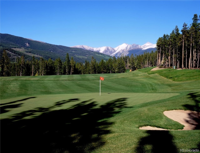 91 River Run Rd Unit 8140, Keystone, CO 80435 - view of community with view of golf course and a mountain view
