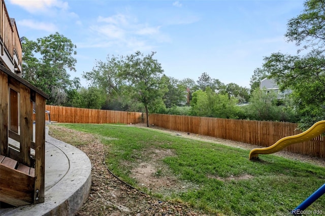 view of yard with a fenced backyard