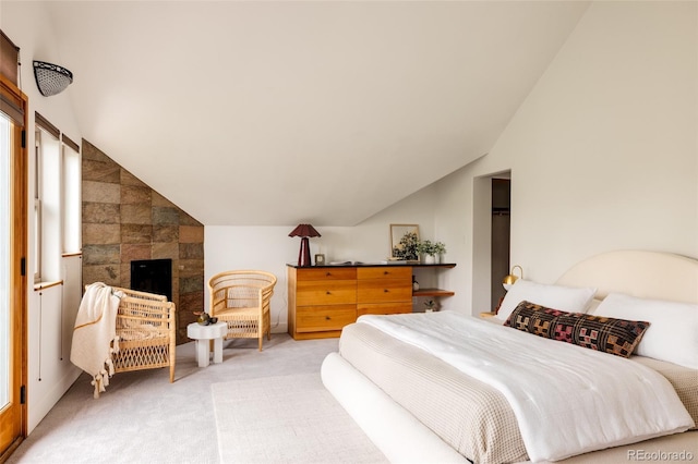 3445 S Clermont St, Denver, CO 80222 - bedroom with lofted ceiling, light carpet, and a tile fireplace