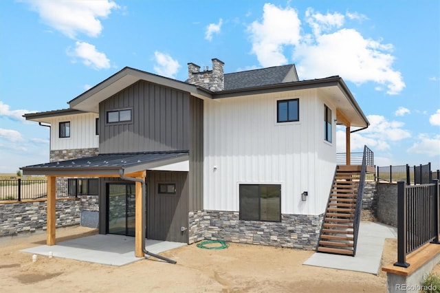 back of property with a patio area