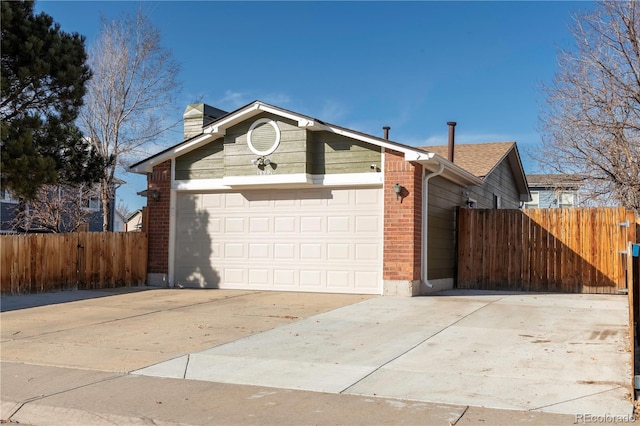 single story home with fence, a chimney, concrete driveway, a garage, and brick siding