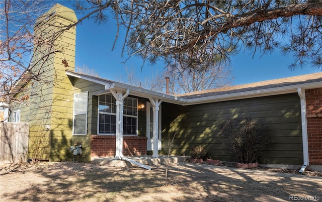 ranch-style home with brick siding