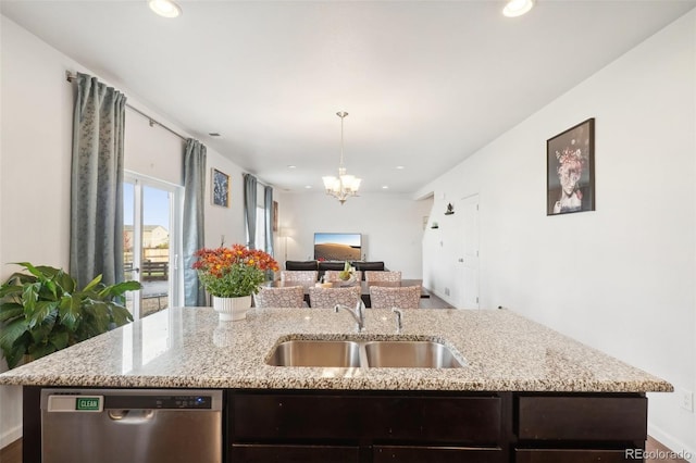 kitchen featuring sink, light stone countertops, dark brown cabinets, and dishwasher