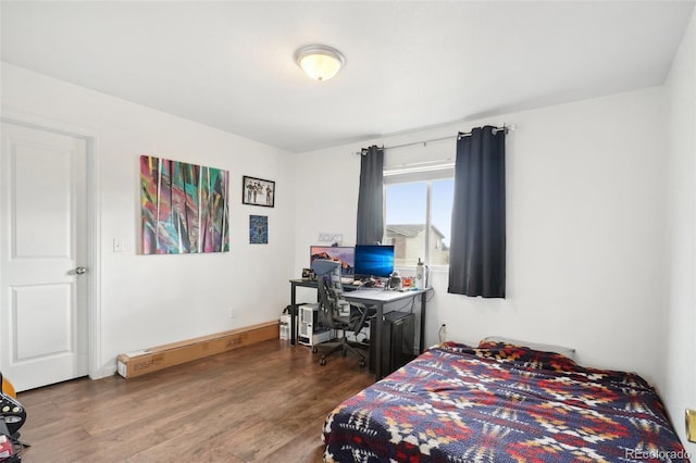 bedroom featuring dark hardwood / wood-style floors