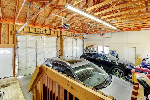 garage featuring a garage door opener