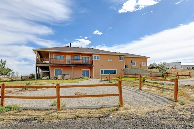 exterior space with a balcony