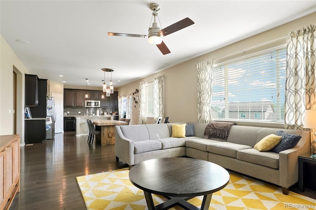 26143 E Fremont Pl, Aurora, CO 80016 - living area with a ceiling fan, wood finished floors, and recessed lighting