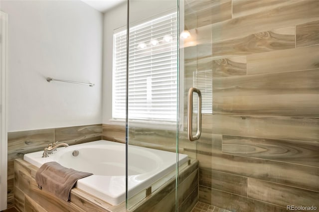 26143 E Fremont Pl, Aurora, CO 80016 - full bathroom with a garden tub and a shower stall