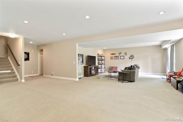 26143 E Fremont Pl, Aurora, CO 80016 - living area with light carpet, recessed lighting, stairway, and baseboards
