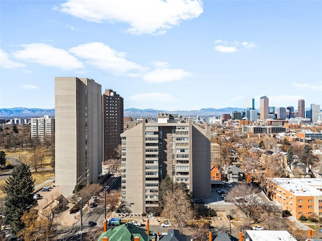 property's view of city featuring a mountain view