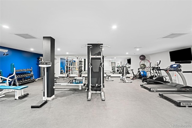 exercise room with visible vents and recessed lighting