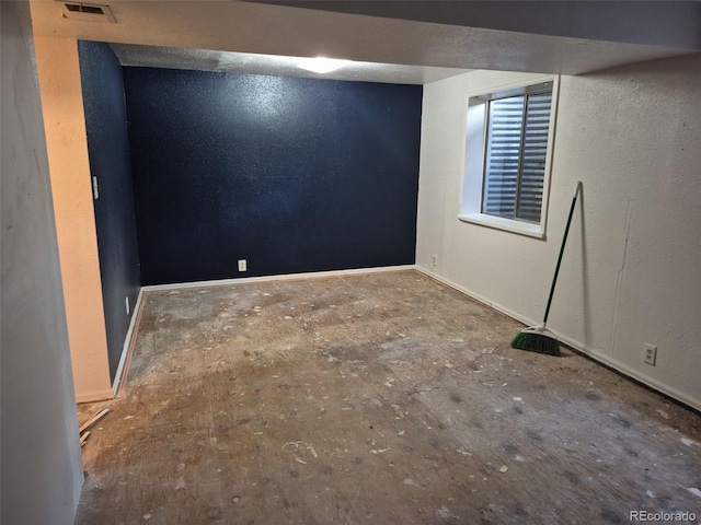 16094 E Exposition Dr, Aurora, CO 80017 - finished below grade area with baseboards and a textured wall
