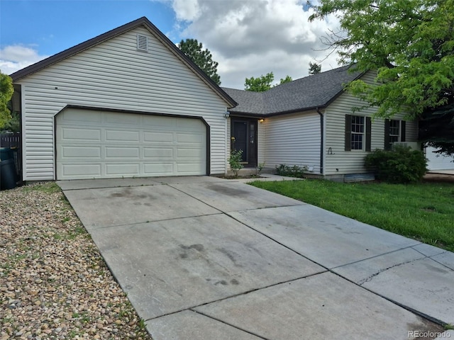 16094 E Exposition Dr, Aurora, CO 80017 - ranch-style home with driveway, a shingled roof, and an attached garage