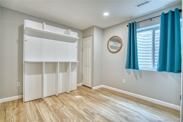 5532 S Valdai Way, Aurora, CO 80015 - unfurnished bedroom with light wood-type flooring, baseboards, and recessed lighting