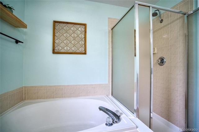 5532 S Valdai Way, Aurora, CO 80015 - bathroom featuring a stall shower and a bath