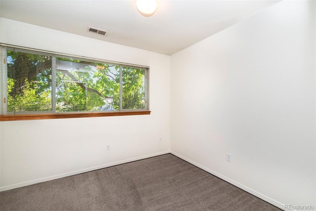 2850 Aurora Ave Unit 112, Boulder, CO 80303 - spare room featuring carpet floors and baseboards