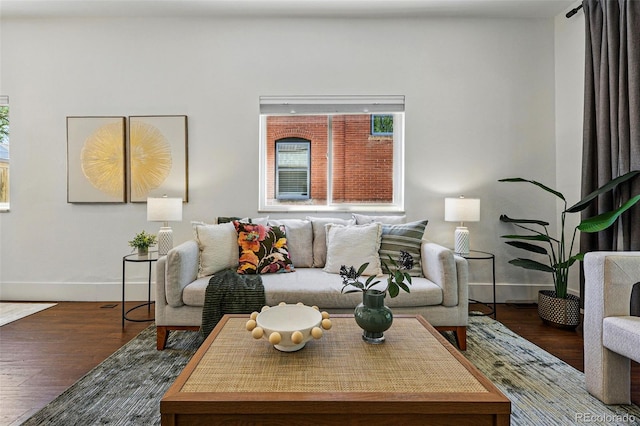 living room with wood finished floors and baseboards