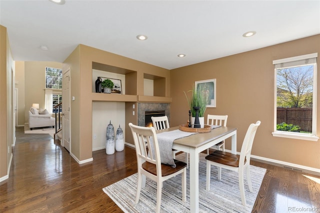 12814 Forest Cir, Thornton, CO 80241 - dining space featuring healthy amount of natural light, baseboards, and recessed lighting